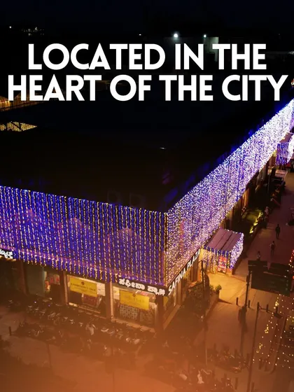 Our venue is located in the heart of the city, as shown by this stunning aerial shot of Safina Plaza lit up at night.