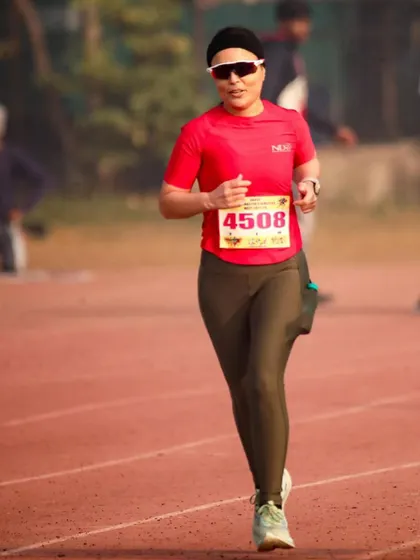This runner is reflecting on her race strategy. Every race is a learning opportunity, helping us understand how to pace better and finish stronger.