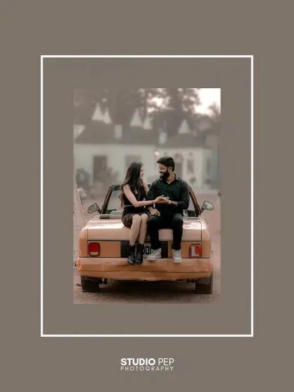 A minimalist and modern portrait of the couple with a vintage car. The clean composition and their stylish pose create a chic and sophisticated image.
