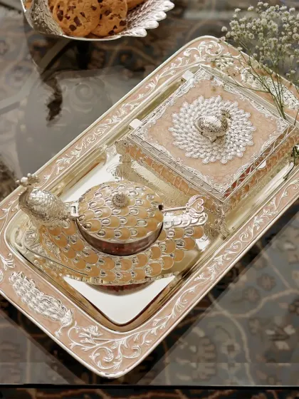 When elegance meets heritage. This handcrafted silverware set, with its intricate peacock and floral details, brings regal charm to your table, making it perfect for serving, gifting, or simply making a statement.