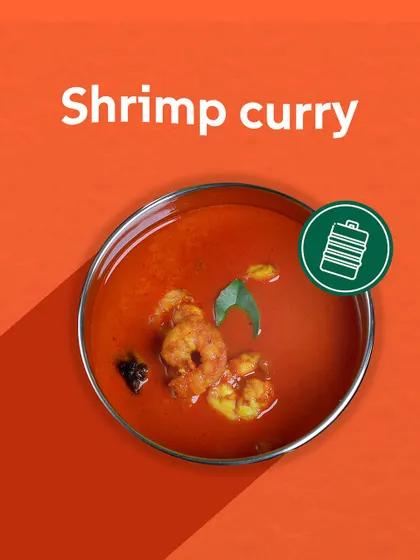 A close-up of a fiery red shrimp curry. My non-veg options bring a taste of coastal and regional Indian cuisines to your daily lunch.