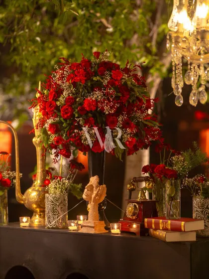 A closer look at the vintage decor elements, including a "silence" sculpture and a brass gramophone horn, which added a quirky and artistic touch to the regal Sufi theme.