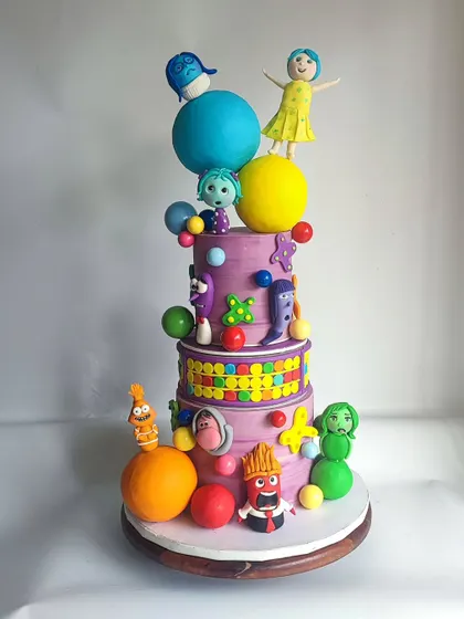 A different angle of the 'Inside Out' cake, showcasing its vibrant colors and complex structure. This was a showstopper cake for a 12th birthday party.