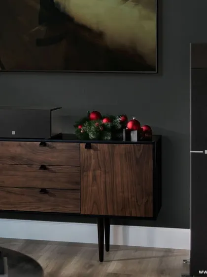 Add an extra touch of festivity to your season with Definitive Technology products. This elegant setup, featuring a tower speaker and center channel, is designed to turn heads and make a statement during your holiday gatherings.