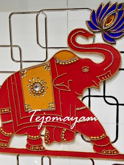 A handcrafted elephant wall hanging, a beautiful and auspicious decor piece for a new home.
