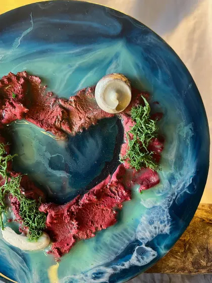 A custom resin clock featuring a "Lover's Island." It's a functional piece of art that serves as a constant reminder of a special person or place.
