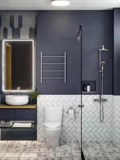 A 3D render of a modern bathroom with dark blue walls, white herringbone tiles, and a backlit mirror, showing my capability in designing stylish and functional bathrooms.