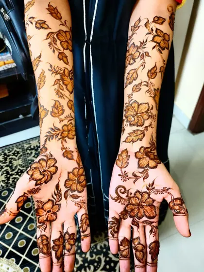 This angle highlights the beautiful spacing and flow of the floral elements in this sleeve design.
