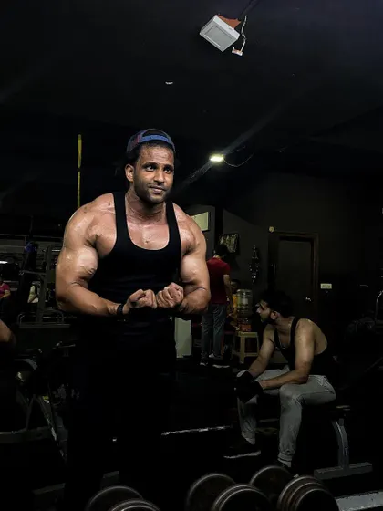 Inspiration exists, but it must find you working. A shot of me posing after a great workout.