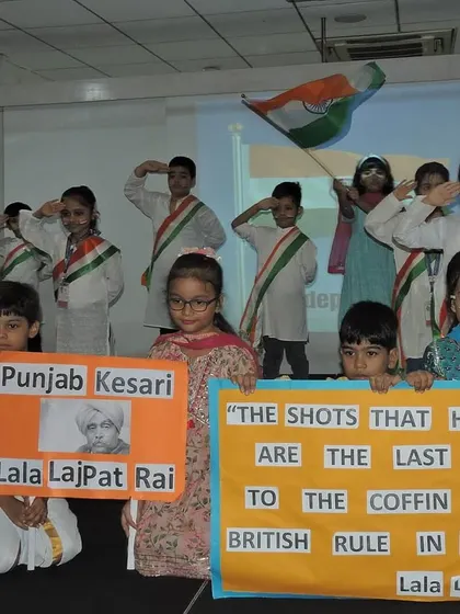Students pay tribute to freedom fighter Lala Lajpat Rai, holding up a poster with his famous quote during the 'Jashn-e-Azadi' competition.
