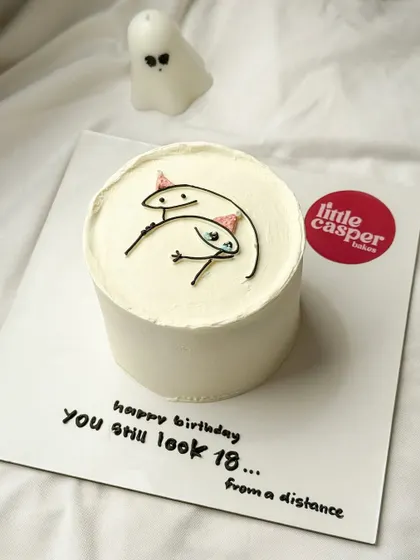 A funny and minimalist cake that's perfect for a friend's birthday. The simple line drawing and witty message make for a unique and trendy design that gets a lot of love online.