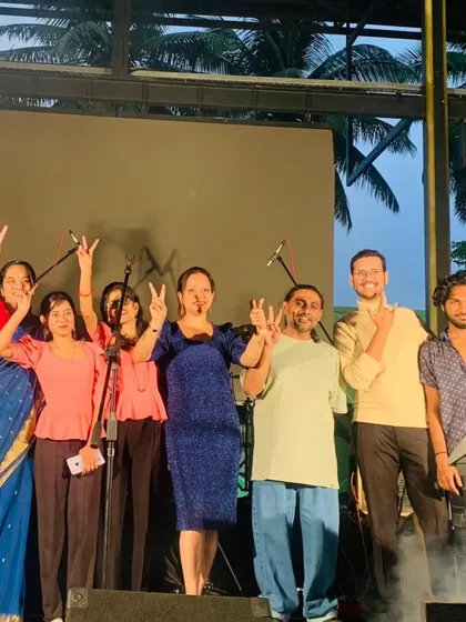 The teaching team and performers on stage after a successful concert. The energy and support from the community make these events truly unforgettable.