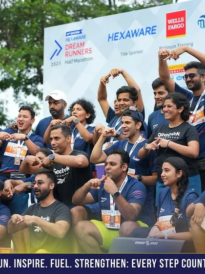 The whole team striking a pose. These are the moments of shared victory that define our community.