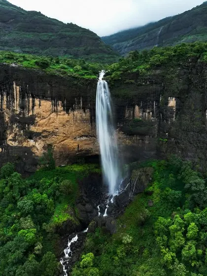Another angle of Daityasur Waterfall, capturing the full drop from the cliff edge to the base. Each angle offers a new appreciation for its scale and beauty.