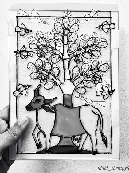 The outline for the Gond-style cow on glass, showing a different artistic interpretation of the same subject.