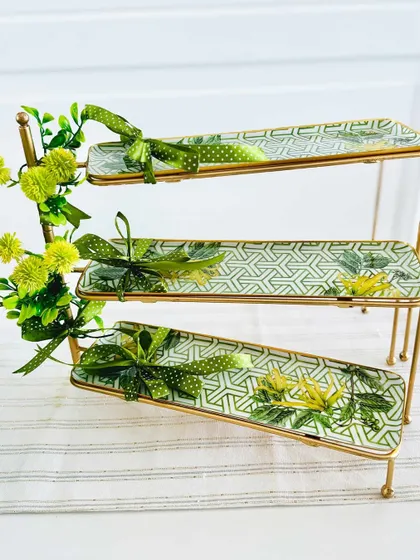 Another view of the Bornea 3-tier stand, highlighting its elegant design and beautiful botanical print. It is a perfect harmony of form and function.