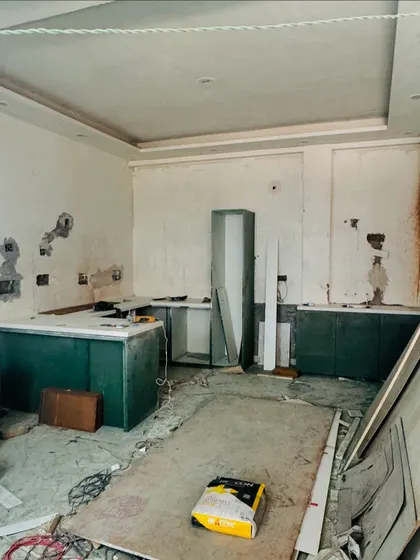 The kitchen during the initial civil work and demolition phase. This is where the transformation begins.