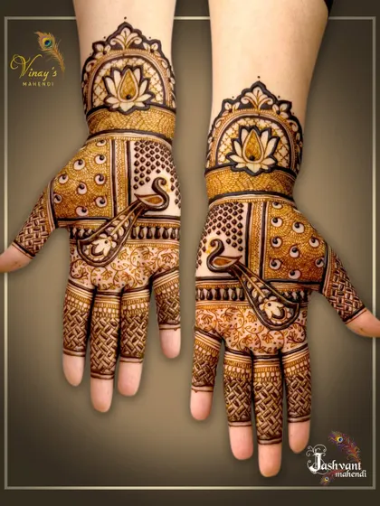 A clean and elegant design featuring swans on the palms, with a beautiful lotus cuff at the wrist. The geometric patterns on the fingers add a modern touch.