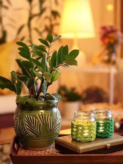 The golden hour in autumn, beautifully captured with these green crochet jar covers.