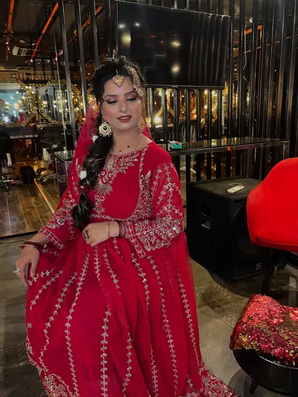 This photo shows the full bridal look in the context of the venue. The bride's makeup and outfit stand out, proving that my looks are designed to be impactful both up close and from a distance.