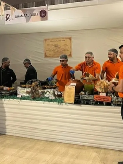 A shot of my team in action at a live chaat stall during an event at Shagun Farms. We ensure service is quick, hygienic, and always with a smile.