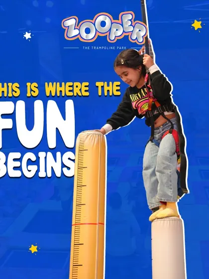 This is where the fun begins. A young adventurer gets ready to take on one of the many climbing challenges.