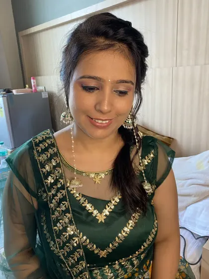 Another shot of this subtle Mehendi look. The makeup is minimal, ensuring the focus remains on the bride and the intricate henna designs.