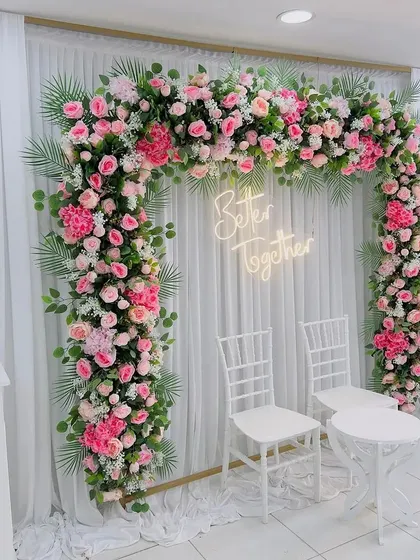 Our "Better Together" neon sign is a popular rental item for engagements, weddings, and anniversaries. It looks fantastic as a photo backdrop, especially when paired with a lush floral arch.