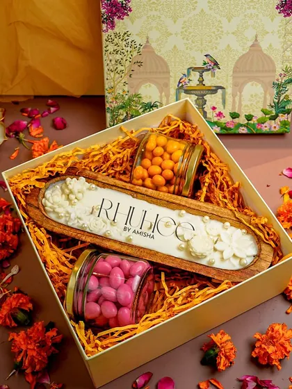 I absolutely love putting together gift hampers that tell a story. This one features my signature wooden boat candle, paired with some delicious treats, all packed in a gorgeous box. It’s the perfect way to show someone you are thinking of them, for Diwali or any celebration.
