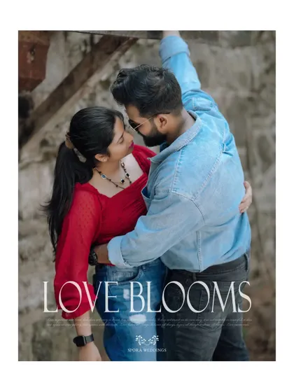 A romantic embrace with the title "Love Blooms," perfectly capturing the couple's blossoming love story.