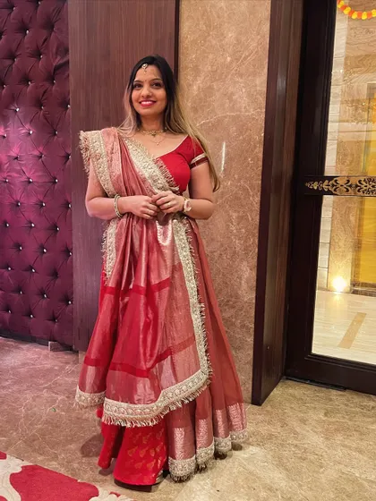 The complete Diwali look, featuring a tissue saree draped over a can-can lehenga for extra volume and drama.