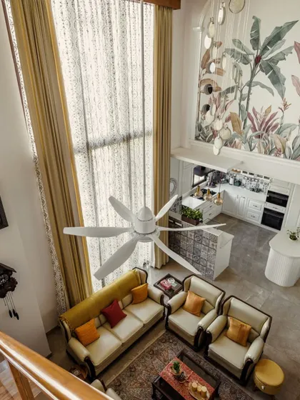 An overhead view of the living room from image 123, highlighting the open layout and double-height space.