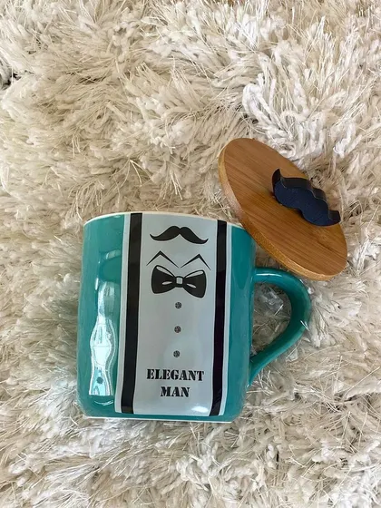 Here is the teal version of our "Elegant Man" mug. This unique item is perfect for corporate gifts that aim to be both practical and memorable, adding a touch of personality to any desk.