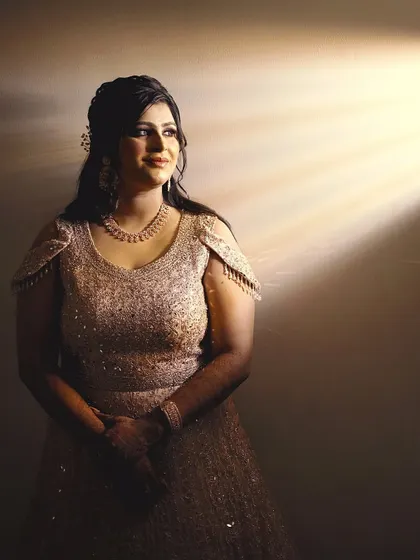 An artistic portrait using a beam of light to create a dramatic and ethereal effect. This makes for a unique and memorable photo.