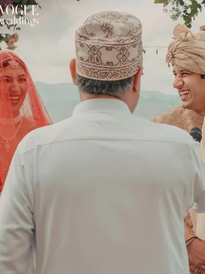 A moment of pure joy and laughter during the ceremony, beautifully captured and featured in Vogue Weddings.