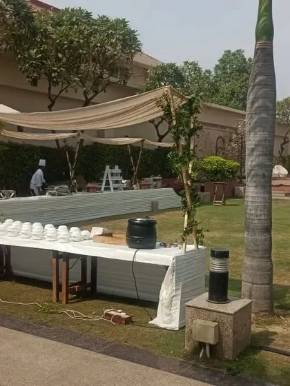 An example of a simple and functional outdoor catering setup. I ensure that the food service area is clean, well organized, and blends with the overall event environment.