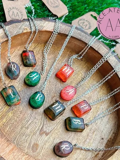 My signature initial pendants are a beautiful way to wear your identity. These custom pendants are available in a variety of colors and styles.