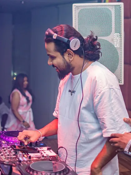 These shots capture me in my element, from different angles and at various events. Each one is a glimpse into my life as a music maker, focused on the craft and connecting with the crowd.