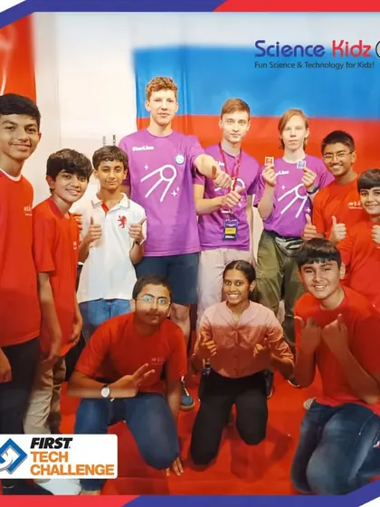 Our team posing with a team from Russia at the First Tech Challenge. These competitions are fantastic opportunities for cultural exchange and building a global network of young innovators.