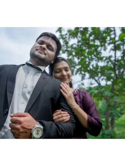 A tender moment where she rests her head on his shoulder. These quiet, emotional shots are a key part of our pre-wedding storytelling.