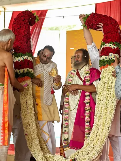 Gurudev is honored with a massive garland during his birthday celebrations. The event is a beautiful expression of the love and gratitude felt by millions around the world.