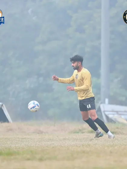 Battling through the elements. Even in foggy conditions, our players are focused and ready to give their all for the team.