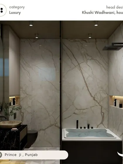 A luxury bathroom design for our client Prince in Punjab. This space features a black marble vanity, a built-in bathtub, and black fixtures against a backdrop of dramatic veined marble tiles.