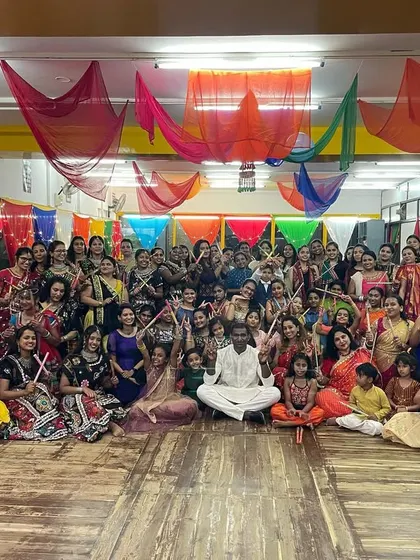 A full-frame group photo capturing everyone who joined our Dandiya celebration.