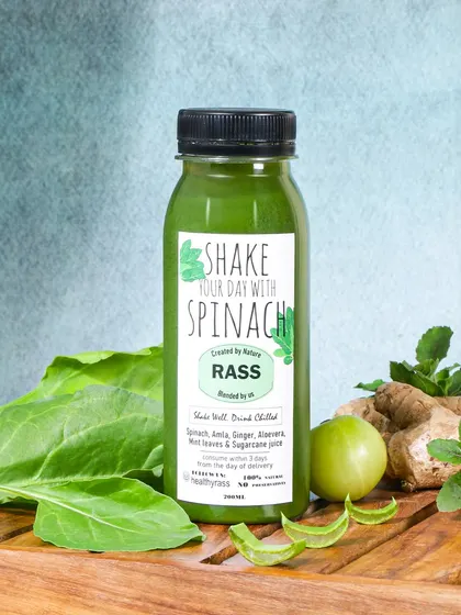For this green juice, I created a rustic, healthy vibe by styling it with its core ingredients like spinach, ginger, and amla. This ingredient focused approach builds trust and emphasizes the product's natural goodness.