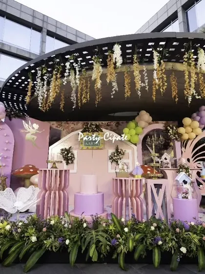 A wide shot of the enchanted forest stage, showing the full scale of the setup with its intricate backdrops, props, and lighting. It was a joy to bring this magical vision to life.