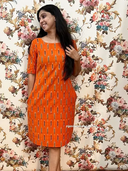 Don't miss this amazing deal on our bestselling orange Ikat dress. It features pockets and is available from XS to 2XL.