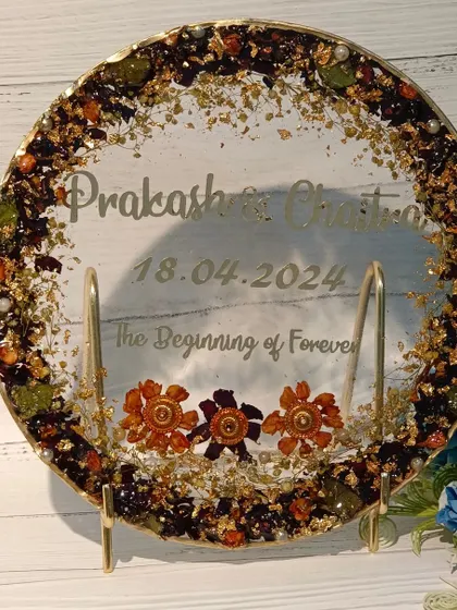 A duplicate of image 105, this "Love" nameplate model is a beautiful way to preserve your flowers in a clear design with a gold rim.