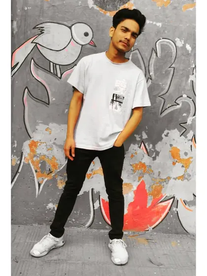 Posing in front of some street art, which is a huge part of Hip Hop culture. My teaching goes beyond dance steps to include the history and culture of the movement.