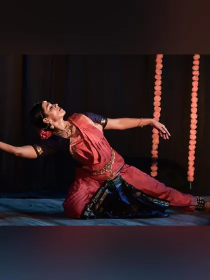 A difficult pose executed with grace, showing the years of dedicated practice.